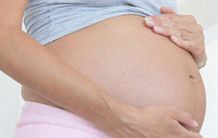 [Translate to Français:] pregnancy and birth