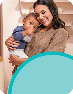 [Translate to French (Reborn):] Mother with Baby and Learner bottle