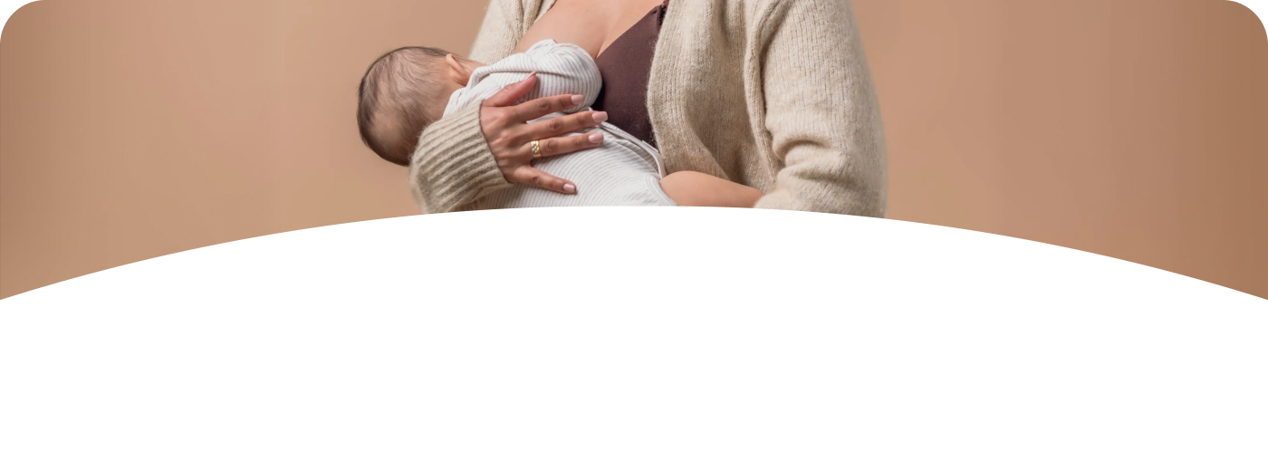 [Translate to French (Reborn):] Breastfeeding mother