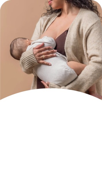 [Translate to French (Reborn):] Breastfeeding mother