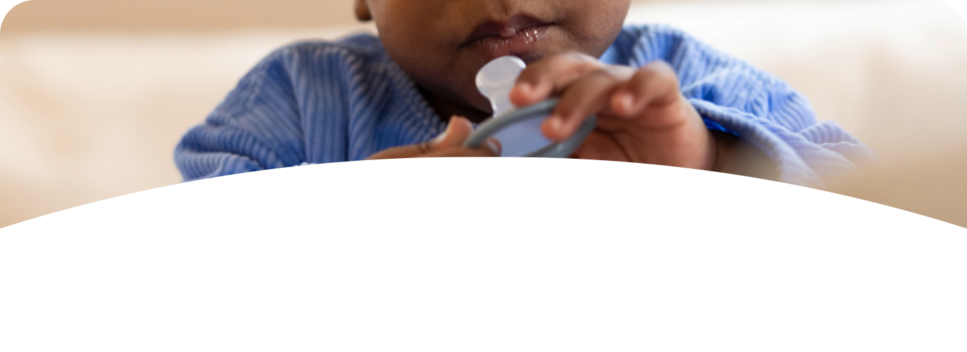 [Translate to French (Reborn):] Baby with soother