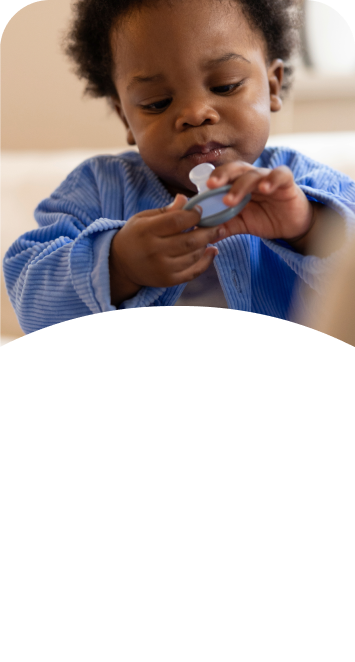 [Translate to French (Reborn):] Baby with soother