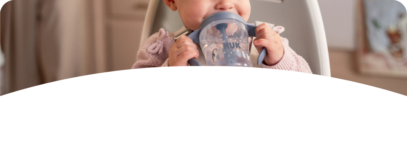 [Translate to French (Reborn):] Baby with Learner Bottle Straw