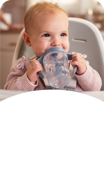 [Translate to French (Reborn):] Baby with Learner Bottle Straw