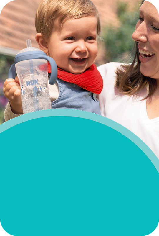 [Translate to French (Reborn):] Mother with Baby and Learner bottle straw