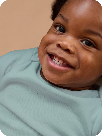 [Translate to French (Reborn):] Babys smile